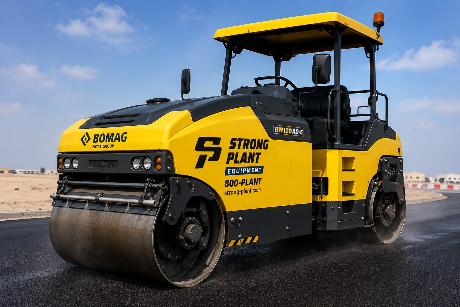 Bomag BW120 AD-5 tandem asphalt roller compacting fresh asphalt